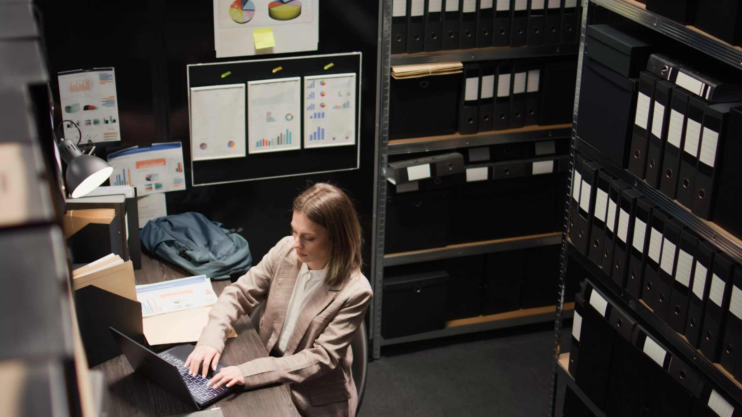 woman with laptop in office desk